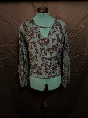 Green and black floral top